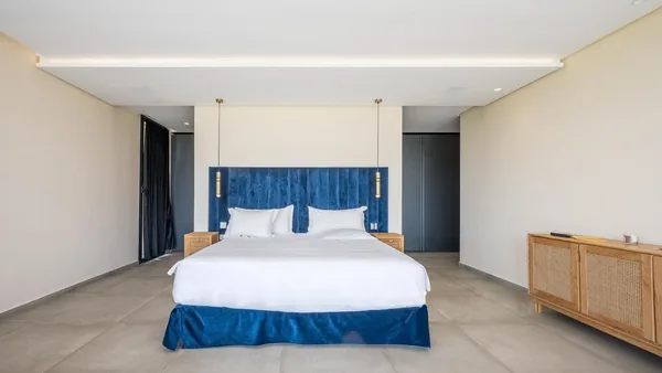 Villa Helena suite with blue headboard