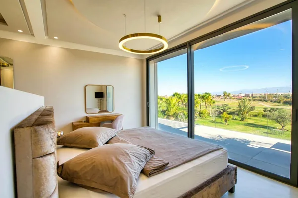 Villa Jordana bedroom opening to garden views
