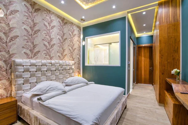 Villa Jordana bedroom with patterned headboard